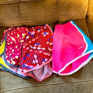 Bundle of girls medium running shorts. Nike and Under Armour